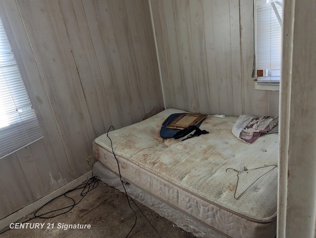 bedroom featuring multiple windows