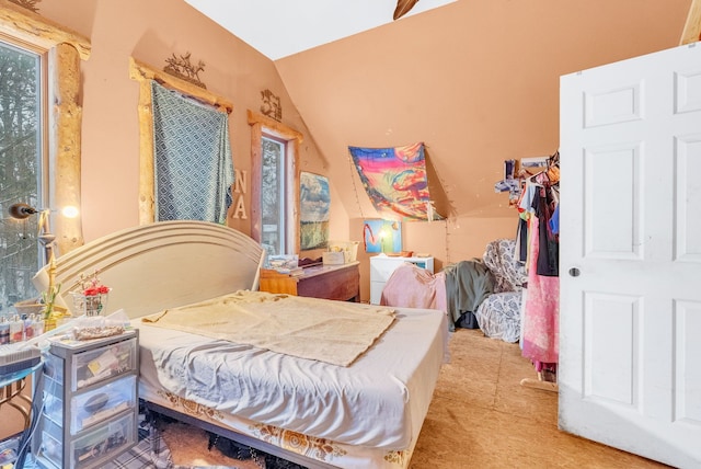 bedroom with vaulted ceiling