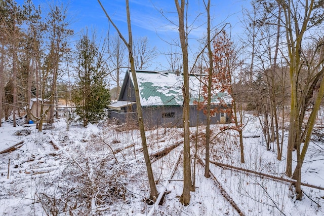 view of snow covered property