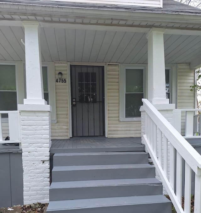 property entrance with a porch