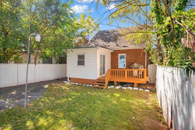 view of outbuilding featuring a fenced backyard