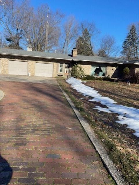 view of front of house with a garage