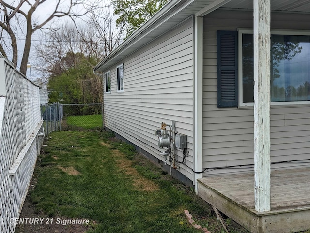 view of home's exterior featuring a lawn