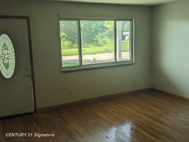 entrance foyer with dark hardwood / wood-style flooring