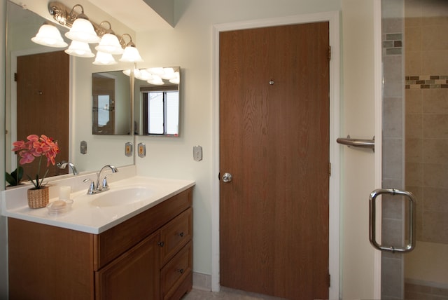 bathroom with vanity and an enclosed shower