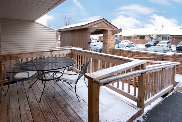 view of snow covered deck