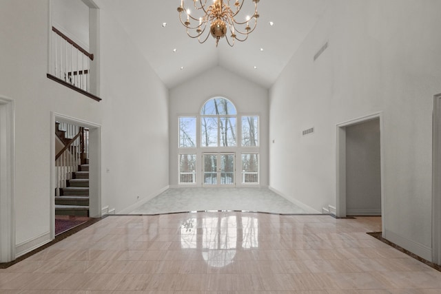 unfurnished living room featuring visible vents, baseboards, stairs, high vaulted ceiling, and a notable chandelier