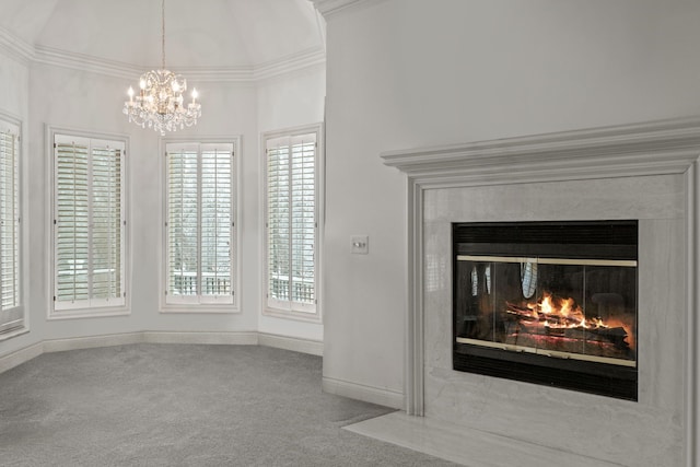 interior details featuring a fireplace with flush hearth, carpet floors, and baseboards