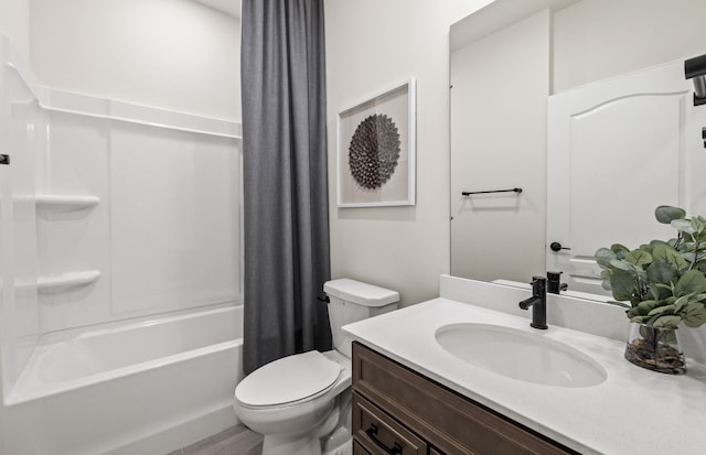 full bathroom with vanity, toilet, and shower / tub combo with curtain