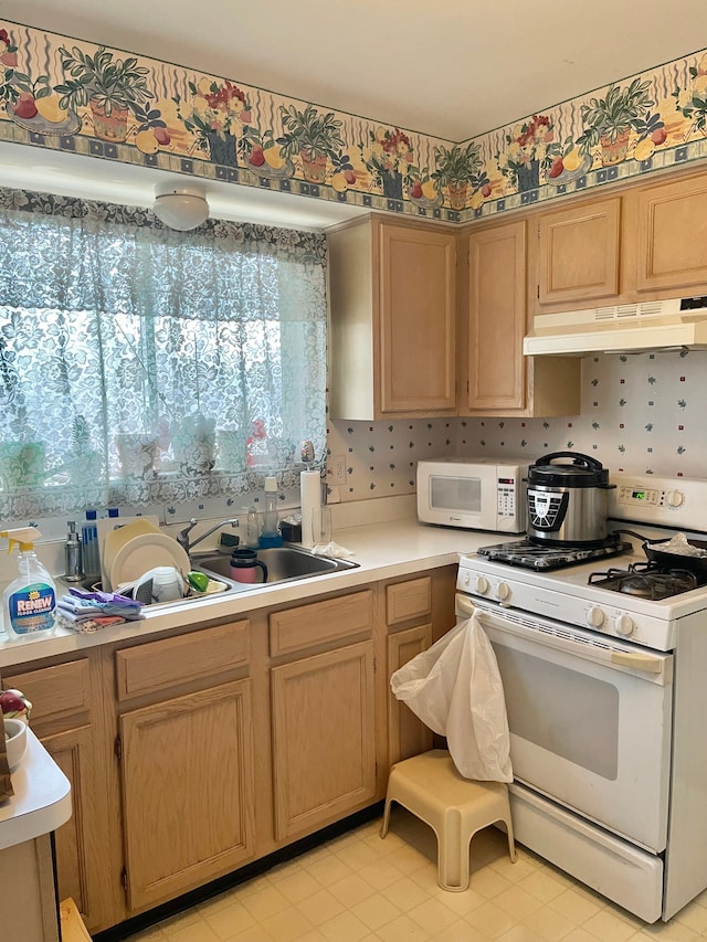 kitchen featuring white appliances and decorative backsplash