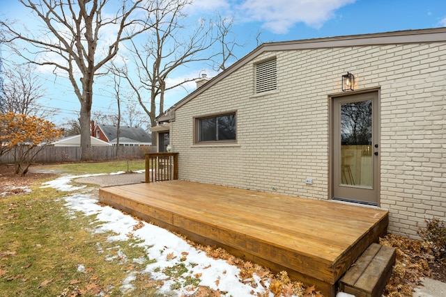 view of snow covered deck