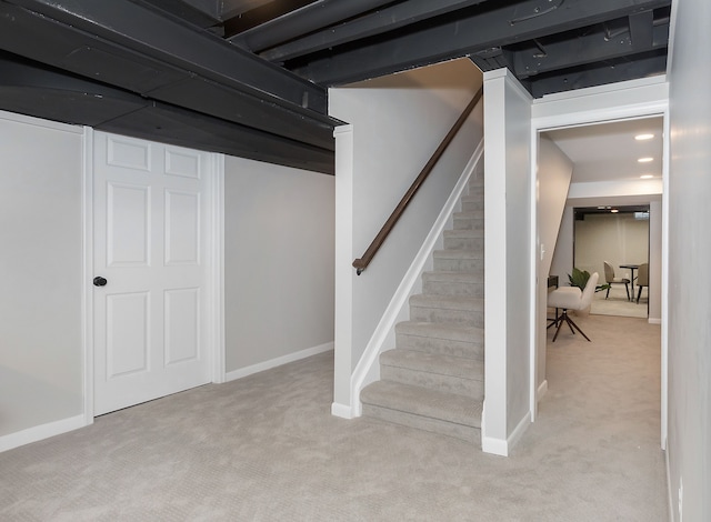 basement with light carpet