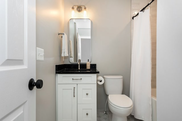 full bathroom featuring vanity, shower / bath combo, and toilet