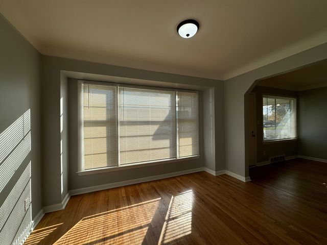 interior space with dark wood-type flooring