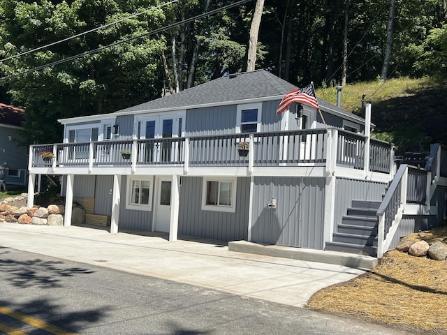 view of front of home featuring a wooden deck