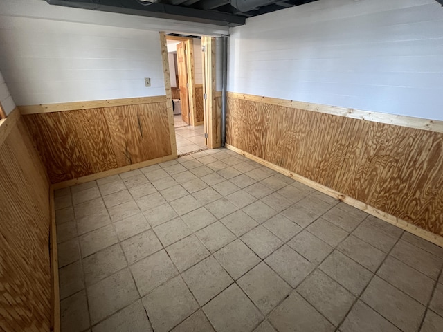 basement with wood walls