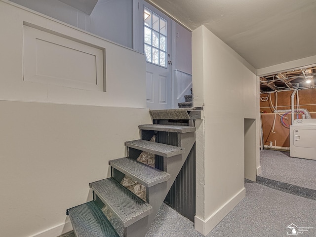 stairway with washer / clothes dryer