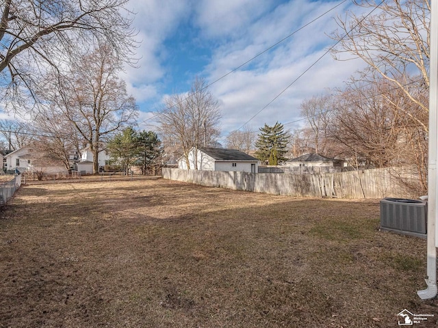 view of yard featuring central AC unit