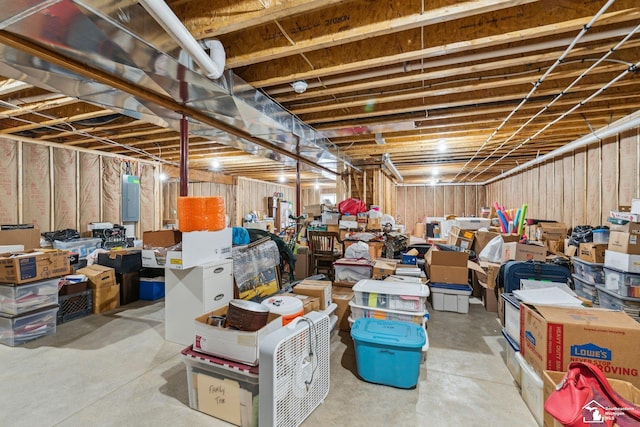 basement featuring electric panel