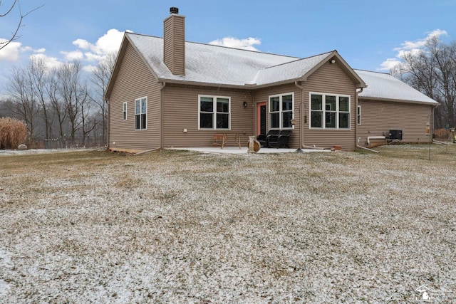 back of property featuring a patio