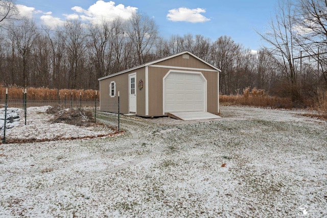 view of snow covered garage