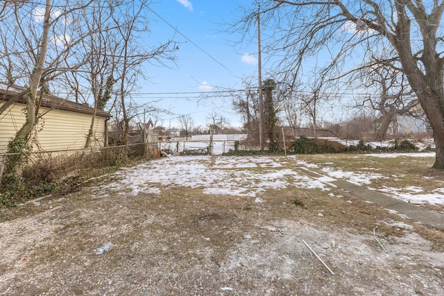 view of yard covered in snow