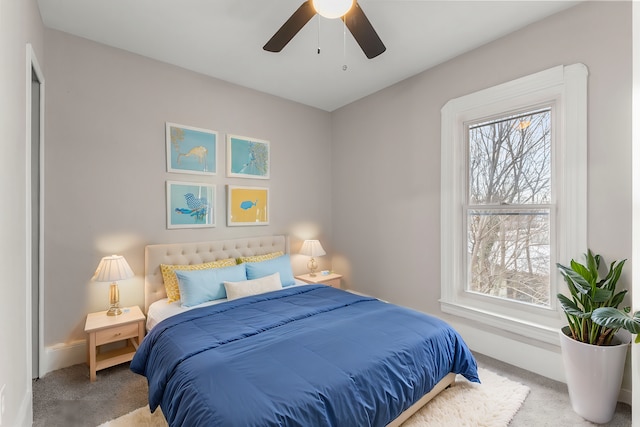 bedroom featuring ceiling fan and carpet flooring