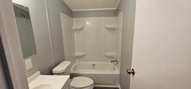 full bathroom featuring vanity, tub / shower combination, a textured ceiling, and toilet