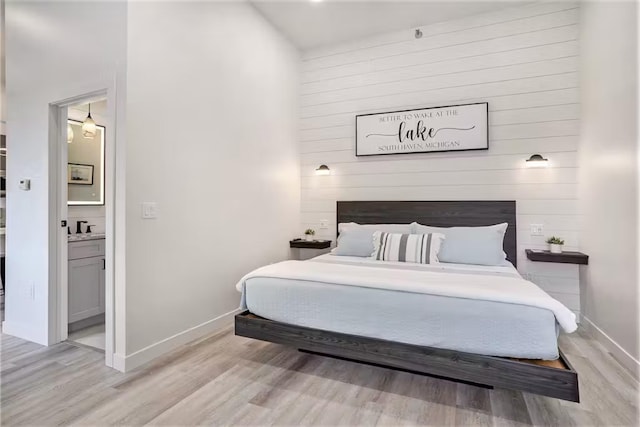 bedroom with light hardwood / wood-style floors