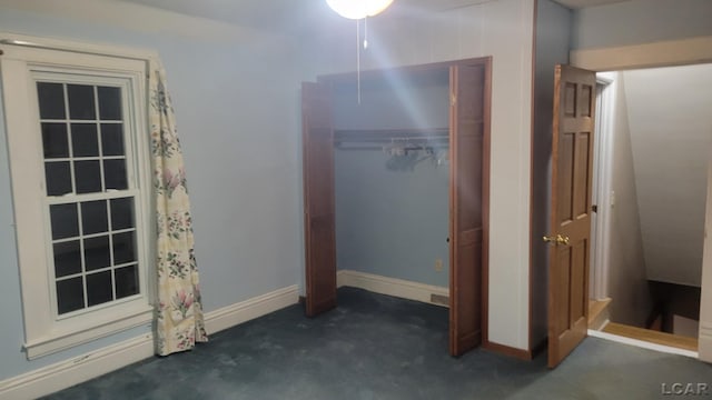 unfurnished bedroom featuring a closet