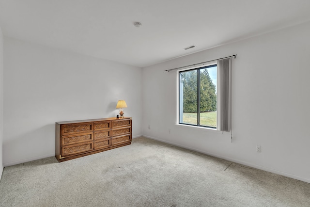 unfurnished bedroom with carpet floors