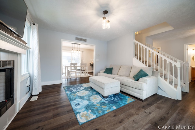 living room with dark wood-type flooring