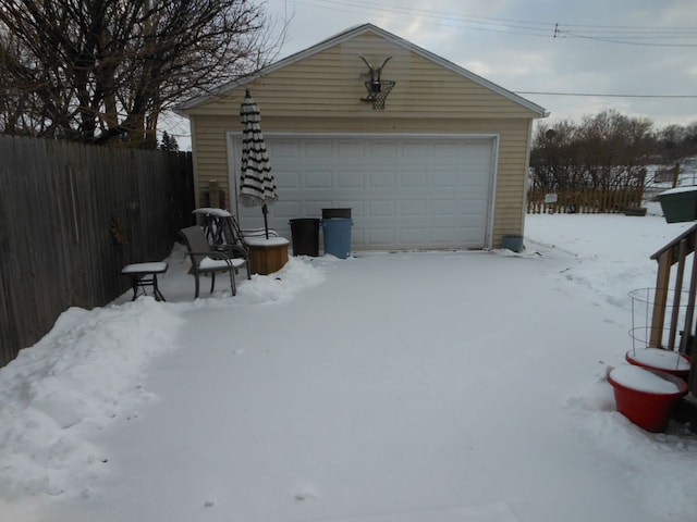 view of snow covered garage