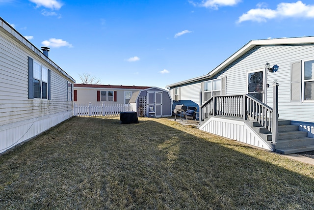 view of yard with a storage unit