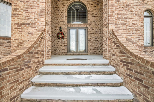 entrance to property featuring french doors