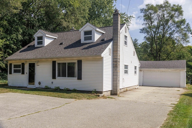 cape cod-style house with a garage