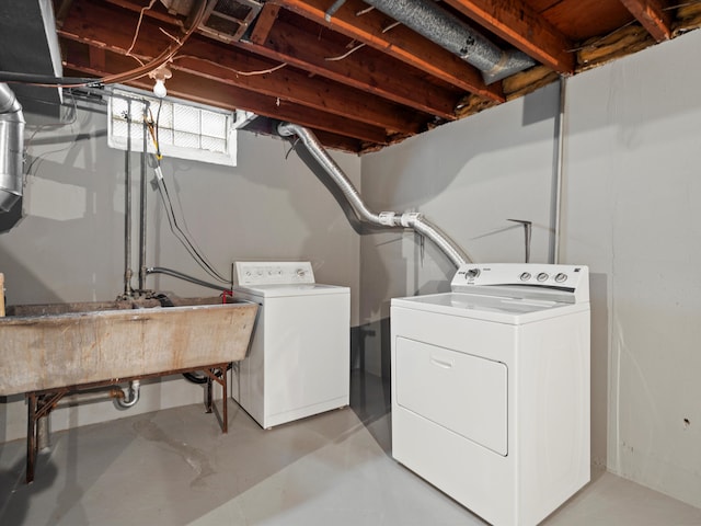 laundry room featuring sink and washing machine and dryer