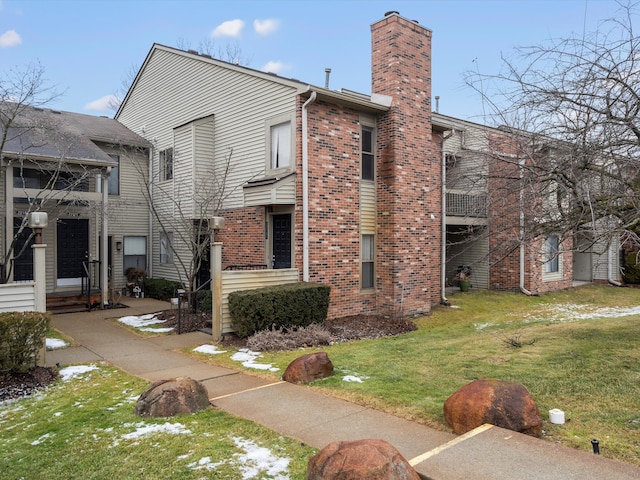 view of home's exterior featuring a lawn