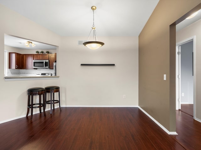 interior space featuring dark hardwood / wood-style floors