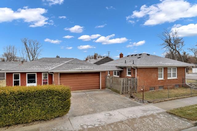 single story home with a garage