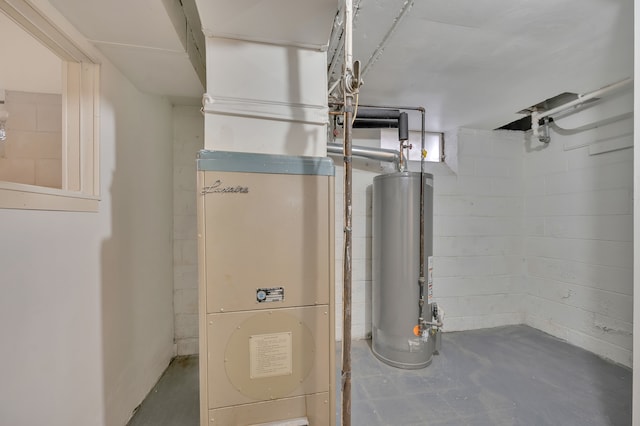 utility room with water heater