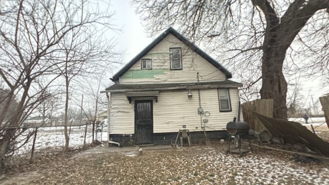 view of snow covered house