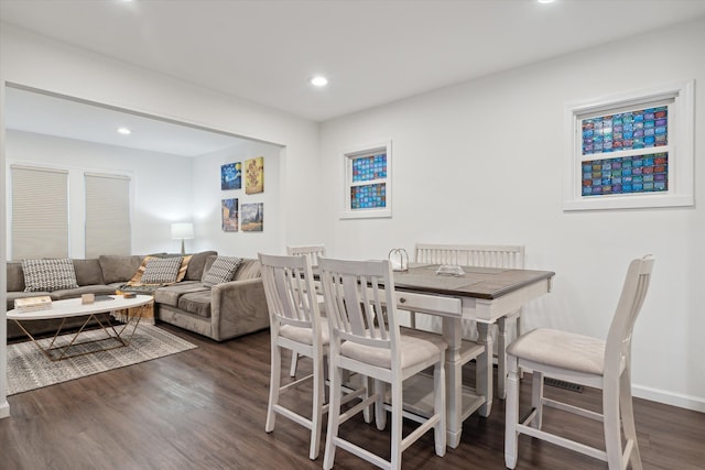 dining room featuring dark hardwood / wood-style flooring