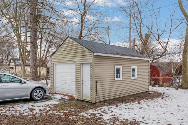 view of snow covered garage