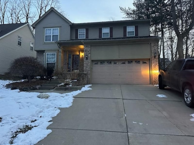 front facade with a garage