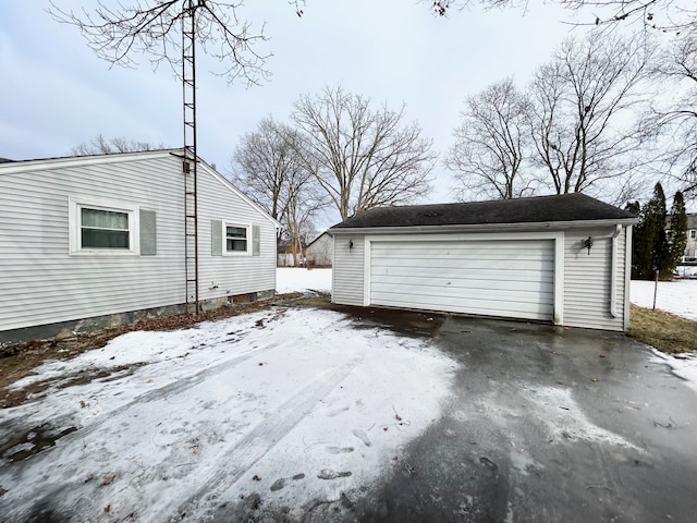 view of snow covered garage