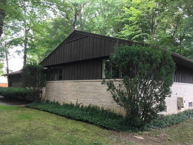 view of home's exterior featuring a lawn