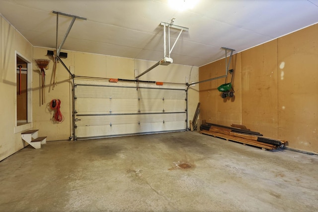 garage featuring a garage door opener