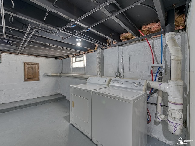 washroom featuring washer and dryer