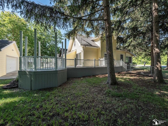 view of yard with a wooden deck